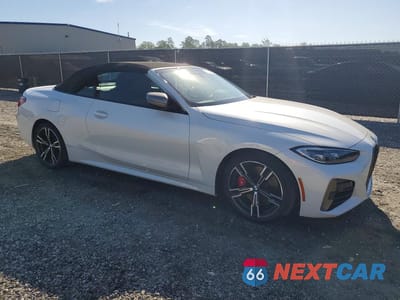 Czwarte zdjęcie samochodu z boku: 2022 BMW M440I VIN:WBA53AT01NCJ15062 - miniatura
