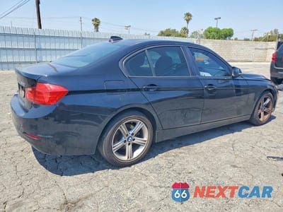 Trzecie zdjęcie samochodu z tyłu: 2014 BMW 320 I VIN:WBA3B1C58EP679404 - miniatura