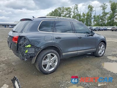 Trzecie zdjęcie samochodu z tyłu: 2015 VOLKSWAGEN TOUAREG V6 TDI VIN:WVGEP9BP7FD003944 - miniatura