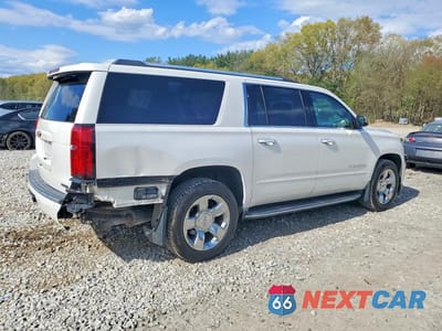 Trzecie zdjęcie samochodu z tyłu: 2017 CHEVROLET SUBURBAN K1500 PREMIER VIN:1GNSKJKC1HR292577 - miniatura
