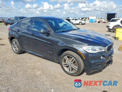 Czwarte zdjęcie samochodu z boku: 2016 BMW X6 XDRIVE35I VIN:5UXKU2C53G0N80210 - miniatura