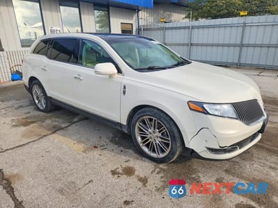 Czwarte zdjęcie samochodu z boku: 2013 LINCOLN MKT VIN:2LMHJ5AT5DBL56518 - miniatura
