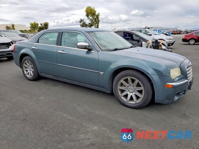 Czwarte zdjęcie samochodu z boku: 2006 CHRYSLER 300C VIN:2C3KA63H56H168381 - miniatura