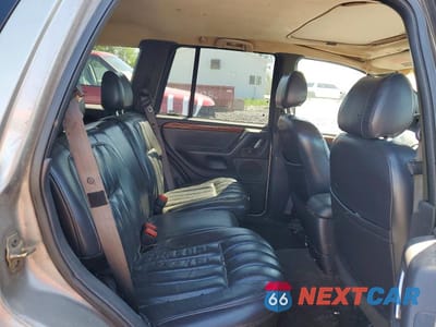 Zdjęcie 10 z 12 samochodu: 1999 JEEP GRAND CHEROKEE LIMITED VIN:1J4GW68N5XC638750 - miniatura