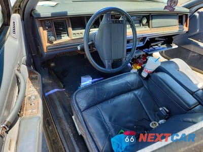Zdjęcie 8 z 12 samochodu: 1992 LINCOLN TOWN CAR CARTIER VIN:1LNLM83W3NY727315 - miniatura