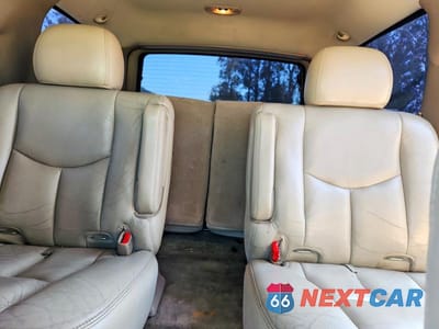 Zdjęcie 10 z 13 samochodu: 2004 GMC YUKON VIN:1GKEC13TX4R259125 - miniatura