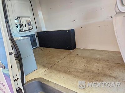 Zdjęcie 11 z 13 samochodu: 2014 NISSAN NV 2500 DELIVERY VAN VIN:1N6BF0LYXEN101384 - miniatura