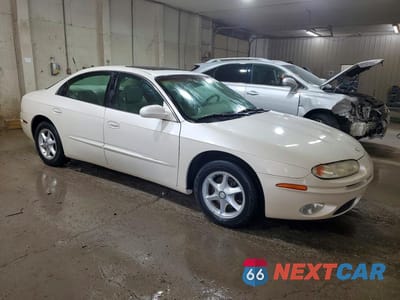 Czwarte zdjęcie samochodu z boku: 2002 OLDSMOBILE AURORA VIN:1G3GR64H524128107 - miniatura