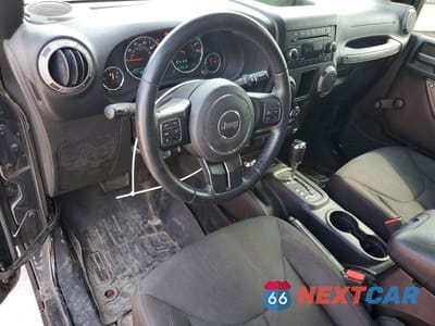 Zdjęcie 8 z 12 samochodu: 2016 JEEP WRANGLER SPORT VIN:1C4AJWAG2GL334703 - miniatura
