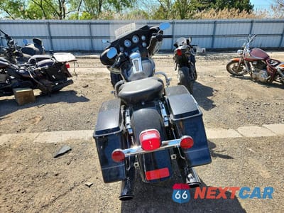 Czwarte zdjęcie samochodu z boku: 2011 HARLEY DAVIDSON FLHX VIN:1HD1KBM10BB675561 - miniatura