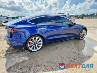Trzecie zdjęcie samochodu z tyłu: 2019 TESLA MODEL 3 VIN:5YJ3E1EB6KF393585 - miniatura