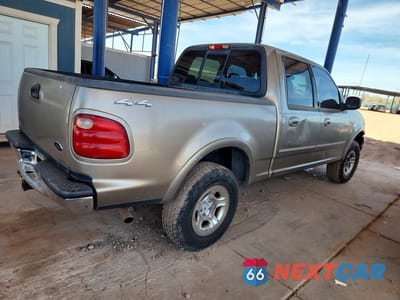 Trzecie zdjęcie samochodu z tyłu: 2001 FORD F-150 VIN:1FTRW08L91KA08608 - miniatura