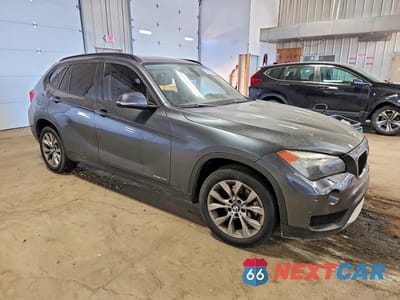 Czwarte zdjęcie samochodu z boku: 2014 BMW X1 XDRIVE28I VIN:WBAVL1C54EVY13634 - miniatura
