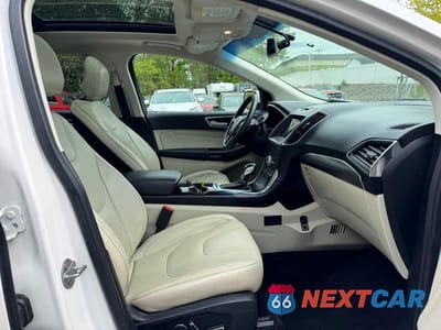 Zdjęcie 12 z 13 samochodu: 2018 FORD EDGE TITANIUM VIN:2FMPK4K86JBB66540 - miniatura