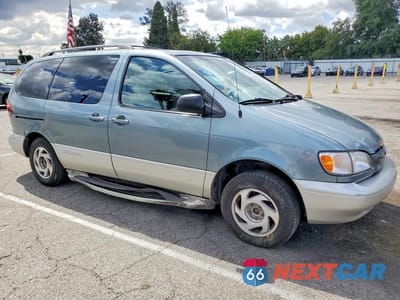 Czwarte zdjęcie samochodu z boku: 1999 TOYOTA SIENNA XLE VIN:4T3ZF13C9XU120905 - miniatura