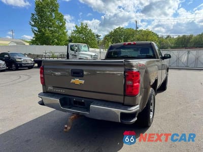 Trzecie zdjęcie samochodu z tyłu: 2015 CHEVROLET SILVERADO K1500 VIN:1GCNKPEH5FZ161021 - miniatura