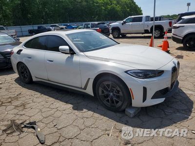 Czwarte zdjęcie samochodu z boku: 2024 BMW I4 EDRIVE 35 VIN:WBY43AW0XRFR52034 - miniatura