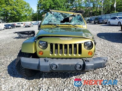 Piąte zdjęcie samochodu w środku: 2007 JEEP WRANGLER SAHARA VIN:1J8GA59147L161148 - miniatura