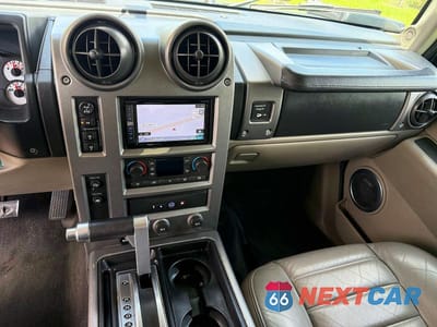 Zdjęcie 11 z 13 samochodu: 2003 HUMMER H2 VIN:5GRGN23U03H119486 - miniatura