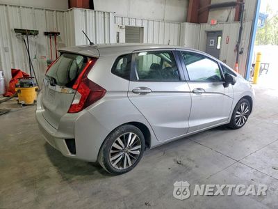 Trzecie zdjęcie samochodu z tyłu: 2016 HONDA FIT EX VIN:JHMGK5H74GX029041 - miniatura
