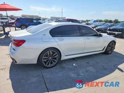 Trzecie zdjęcie samochodu z tyłu: 2019 BMW M760 XI VIN:WBA7H6C58KG615050 - miniatura