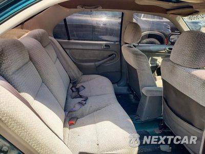 Zdjęcie 19 z 26 samochodu: 1999 HONDA CIVIC LX VIN:2HGEJ6670XH560411 - miniatura