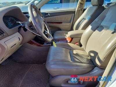 Zdjęcie 7 z 12 samochodu: 2002 TOYOTA CAMRY XLE V6 VIN:JTDBF30K420002122 - miniatura