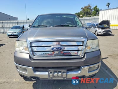 Piąte zdjęcie samochodu w środku: 2005 FORD F150 VIN:1FTPX14595NC09883 - miniatura