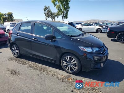 Czwarte zdjęcie samochodu z boku: 2015 HONDA FIT EX VIN:3HGGK5H84FM762948 - miniatura