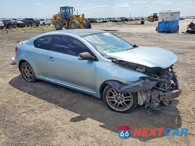 Czwarte zdjęcie samochodu z boku: 2005 SCION TC BASE VIN:JTKDE167450001374 - miniatura