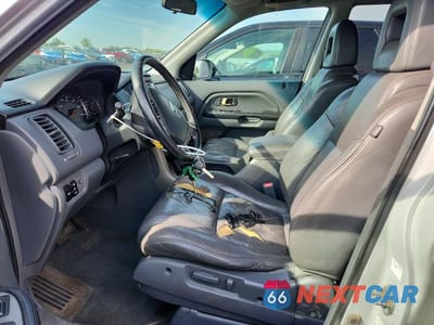 Zdjęcie 7 z 13 samochodu: 2003 HONDA PILOT EXL VIN:2HKYF18533H614412 - miniatura