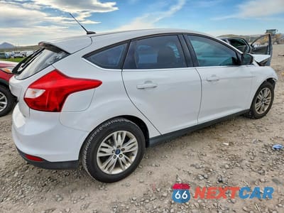 Trzecie zdjęcie samochodu z tyłu: 2012 FORD FOCUS SEL VIN:1FAHP3M20CL393776 - miniatura