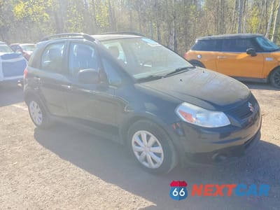 Czwarte zdjęcie samochodu z boku: 2012 SUZUKI SX4 VIN:JS2YB5A34C6306239 - miniatura