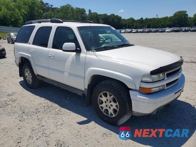 Czwarte zdjęcie samochodu z boku: 2003 CHEVROLET TAHOE K1500 VIN:1GNEK13Z13R288425 - miniatura