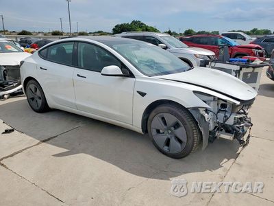 Czwarte zdjęcie samochodu z boku: 2023 TESLA MODEL 3 VIN:5YJ3E1EA7PF405905 - miniatura
