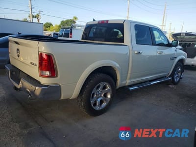 Trzecie zdjęcie samochodu z tyłu: 2018 RAM 1500 LARAMIE VIN:1C6RR7NM4JS248007 - miniatura