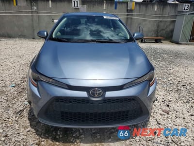 Piąte zdjęcie samochodu w środku: 2021 TOYOTA COROLLA LE VIN:JTDEPMAEXMJ184608 - miniatura