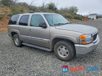 Czwarte zdjęcie samochodu z boku: 2001 GMC YUKON VIN:1GKEK13T11J265926 - miniatura