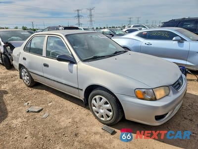 Czwarte zdjęcie samochodu z boku: 2001 TOYOTA COROLLA CE VIN:1NXBR12E31Z500978 - miniatura