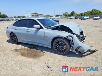 Czwarte zdjęcie samochodu z boku: 2023 BMW 330E VIN:3MW39FF06P8C90612 - miniatura