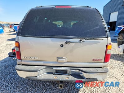 Zdjęcie 6 z 13 samochodu: 2000 GMC YUKON VIN:1GKEK13T0YJ146727 - miniatura