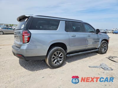 Trzecie zdjęcie samochodu z tyłu: 2023 CHEVROLET SUBURBAN K1500 Z71 VIN:1GNSKDKD1PR540349 - miniatura
