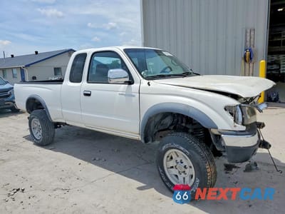 Czwarte zdjęcie samochodu z boku: 2000 TOYOTA TACOMA XTRACAB LIMITED VIN:4TAWN74N5YZ644753 - miniatura