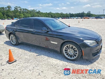 Czwarte zdjęcie samochodu z boku: 2015 BMW 740 LI VIN:WBAYE4C5XFD947113 - miniatura