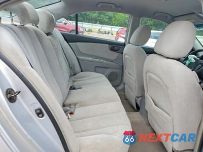 Zdjęcie 10 z 12 samochodu: 2006 KIA OPTIMA LX VIN:KNAGE123965036128 - miniatura
