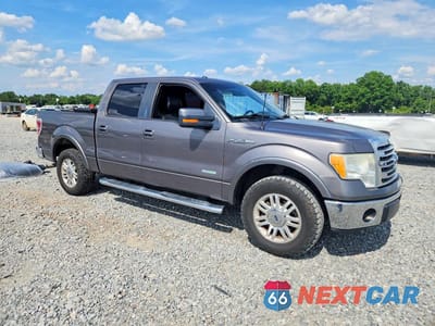 Czwarte zdjęcie samochodu z boku: 2014 FORD F150 SUPERCREW VIN:1FTFW1CT7EKD09111 - miniatura