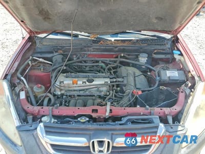 Zdjęcie 12 z 13 samochodu: 2004 HONDA CR-V LX VIN:JHLRD684X4C022603 - miniatura