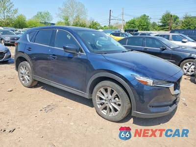 Czwarte zdjęcie samochodu z boku: 2021 MAZDA CX-5 GRAND TOURING VIN:JM3KFADM3M0478470 - miniatura
