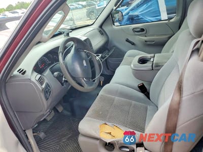 Zdjęcie 7 z 12 samochodu: 2003 FORD F150 VIN:1FTRX172X3NA44563 - miniatura