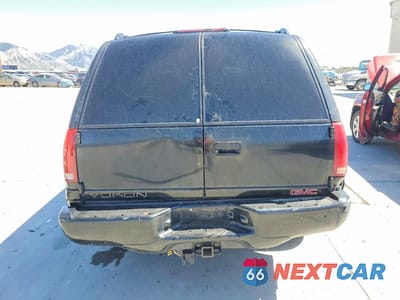 Zdjęcie 6 z 13 samochodu: 2000 GMC YUKON DENALI VIN:1GKEK13R8YR107177 - miniatura